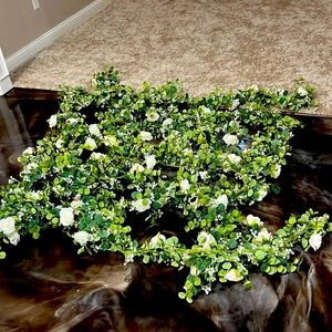 Artificial eucalyptus flower strands.